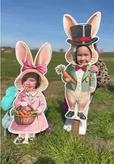A montage of a family day out at Green Barn Farm during their Easter event. The video features children interacting with various farm animals, including chicks, lambs, and bunnies, as well as participating in activities like face painting, crafts, a tractor ride, and toasting marshmallows.