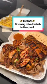 A review of Botan, a kebab shop in Liverpool, highlighting the value and portion size of their special kebab platter. The video features close-ups of the food, the shop exterior, and the interior, presented in a casual, vlog-style format.
