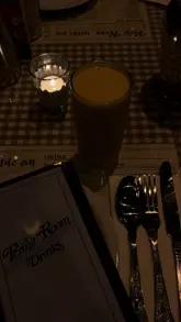 A short, energetic video showcasing a visit to Dishoom Permit Room in Liverpool. The footage captures the entrance, the serving of drinks, a table spread with various Indian dishes, interior shots, tea service, and a dessert, providing a comprehensive look at the dining experience.