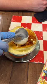 Close-up of viral banana creme brûlée ice cream from Ice Cream Samosorn in Bangkok, Thailand. A popular sweet Thai dessert.