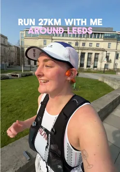 Runner training for a marathon in Leeds, completing 27KM through city streets and parks.