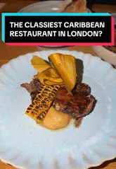 A review of The Good Front Room in East London, featuring Chef Dom Taylor's refined Caribbean cuisine. The video highlights the restaurant's classy atmosphere, the sharing menu, and specific dishes like jerk chicken, curry goat, and red mullet.