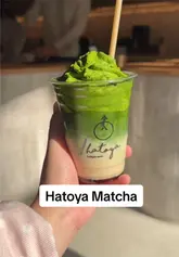 Creamy matcha latte from Hatoya Matcha cafe in Shibuya, Tokyo, Japan.