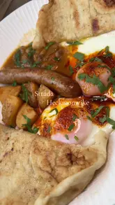 Full English breakfast with eggs, bacon, sausage, beans, mushrooms & toast at Strada Cafe 1 in Batley, Leeds.