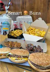 A fast-paced promotional video for Smart Buns in North London, showcasing a variety of their menu items including burgers, wings, loaded fries, and rice boxes. The video uses quick cuts to highlight the food's presentation and texture, aiming to appeal to fans of fast-food style dining.