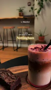 Assortment of coffee drinks and delicious pastries on a counter at a cafe in Nottingham.