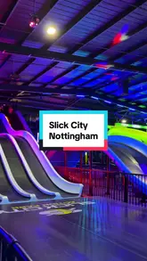 A fast-paced montage showcasing the various slides and activity zones at Slick City Action Park, featuring children and adults enjoying the facilities.