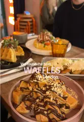 Vibrant restaurant interior in South East London, with stylish decor and an inviting atmosphere, a popular spot for dining.