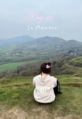 The video is a day-in-the-life style vlog documenting a stay at The Malvern Spa Hotel. It features shots of the hotel's spa facilities, a hotel breakfast, and the surrounding Malvern Hills, including hiking trails and a nearby pub. The creator provides a voiceover explaining the convenience of the location for hikers.