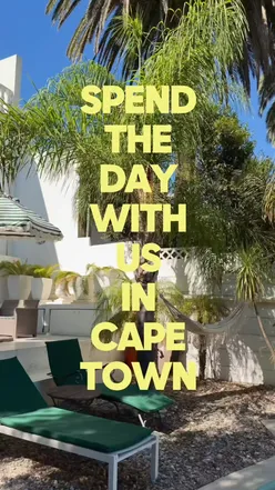 A vibrant Cape Town travel montage, featuring an early morning run, a sunny beach, and a beautiful vineyard with Table Mountain.