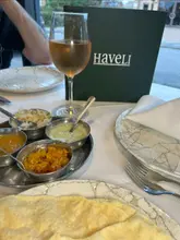 Delicious Indian curries, rice, and naan bread served on a table at Haveli restaurant, Great Lumley.
