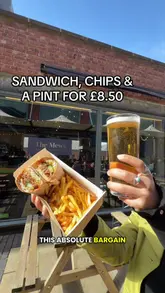 A Reuben and Dorsey sandwich, chips, and a pint of beer from The Mews MCR for their £8.50 lunch deal.