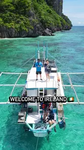 Scenic green coastline and blue Atlantic Ocean on the West of Ireland. Ideal for discovering the Wild Atlantic Way & Ireland tourism.