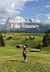 Panoramic view of the Italian Dolomites mountains, featuring stunning peaks, green meadows, and clear lakes for a 7-day trip.