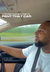 A car driving on a scenic road in Jamaica, promoting the idea of renting a car to explore the island and enhance your trip.