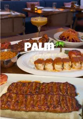 Delicious Turkish food spread at Palm Restaurant in Milton Keynes, featuring kebabs, mixed grill, shawarma, and mocktails.