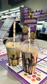 A short, energetic video showcasing a visit to the Burger Boi counter located inside a Morrisons supermarket in Manchester. The video features quick cuts of the menu, the ordering process, and close-ups of the food, including burgers, wraps, tater tots, and milkshakes.