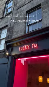 Assortment of Karaage fried chicken, crispy potatoes, pork gyozas, duck bao buns & salad at Lucky Yu, Edinburgh.