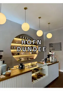 Stylish and welcoming Höfn coffee shop in Dundee city centre. Modern decor, warm lighting, and comfortable seating areas.