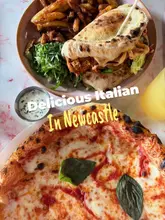 A delicious pizza dough sandwich on a modern table inside Circo Italian restaurant in Newcastle.