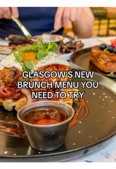 A short, punchy review of a brunch spot in Glasgow, featuring close-ups of popular dishes like French toast and chicken & waffles, alongside a quick look at the menu and interior.