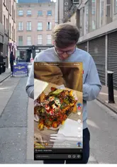 Golden crispy fries from Street Frites IE in a branded carton, ready to eat on Duke Lane, Dublin.