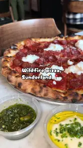 A delicious pizza with a creamy burrata topping, served at Wildfire Pizza in Sunderland.