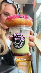 Doughnotts' new matcha menu featuring green glazed doughnuts and a matcha latte, available at their Nottingham store.