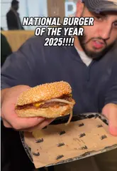 A food review video featuring a visit to Black Bear Burger in Westfield, London. The creator samples various starters including wings, bone marrow, and Yorkshire puddings, followed by a review of the award-winning Meso burger.