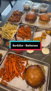 Gourmet burger, crispy chicken tenders, and fries at BUR & GUR Burgers & Shakes in Battersea, London.
