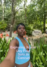 Exploring Xcaret Eco-Archaeological Park in Cancun, Mexico, showcasing wildlife like parrots, dolphins, and lizards.