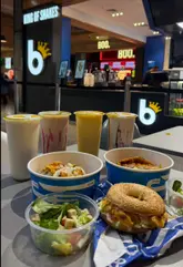 A promotional video showcasing a new food court branch of Berries and Big Jack Potatoes, highlighting the self-service kiosks, menu screens, and a variety of shakes, jacket potatoes, and bagels.