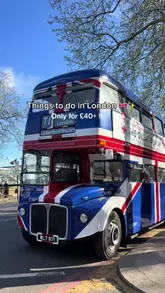 Red 1960s double-decker bus with people enjoying afternoon tea while touring London landmarks.