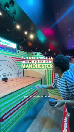 NEW fun activity launched in Manchester in Printworks!! ⭐️🪩👀🤩 @gameface.bar  Gameface is a social playground and interactive experience for groups to compete, sabotage, cause chaos and have FUN!!  ⭐️ 10 unique games - house party themed (mix of physical, thinking, coordination and problem solving) 🧑‍🧑‍🧒‍🧒 2-6 players per game (6+ group bookings available) 💰 From £26pp - £37pp: • standard: from £26pp • standard + shuffleboard: from £33pp • standard, shuffleboard + photobooth token: from £37pp 🕰️ 90 minutes (30 mins for drinks/briefing/socialising and 60 mins of gameplay) ✅ Wheelchair accessible 🎟️ Wristband to tap in to each game & track points (you can see leaderboard at the bar) 🍹 Drinks available at the bar 📸 Photobooth for pictures (£5)  👟 I recommend wearing flat shoes because there’s a lot of movement involved. 📍 Gameface, Printworks, 27 Withy Grove, Manchester, M4 2BS It’s basically a social gaming bar with games, challenges and a bar atmosphere so it’s perfect for friends, fun nights outs, date night, team socials or celebrations. You’ll get so competitive in each game & be in hysterics. I will 1000% be going back! ❤️ ps if you book, the gameplay is 1 hour but you should arrive 30 mins before your set start time for check-in, briefing and drinks. #manchesteractivities #manchesterthingstodo #interactiveexperience #groupactivity #manchester  