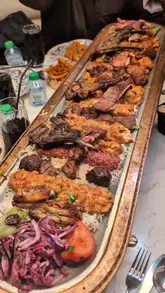 Chef Burak Gurme's Ottoman Platter: a Turkish feast of grilled meats, lamb, chicken, rice, and bread in Birmingham on Ladypool Road.