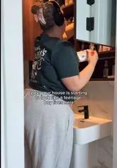 Friends collaborating to deep clean and tidy a home as part of a 'house reset' hangout. Shows a productive 'clean with me' session.