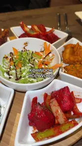 A video review of an Indian restaurant in Holywood, County Down, featuring a variety of starters, mains, and sides, along with a look at the venue's interior and menu.