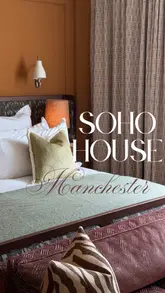 A detailed tour of a hotel room at Soho House Manchester, highlighting the interior design, amenities, minibar, and breakfast options.