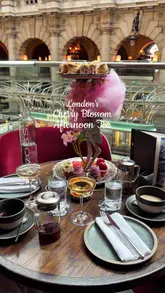 Here are a few options for your SEO alt text, depending on the focus of the image:

**Option 1 (Descriptive & SEO-focused):**
"Cherry Blossom Afternoon Tea at Jang Restaurant in the Royal Exchange, London featuring themed cakes and champagne."

**Option 2 (Action-oriented):**
"Close-up of a floral Cherry Blossom Afternoon Tea spread with cakes and tea at Jang Restaurant, London."

**Option 3 (Concise):**
"Spring Cherry Blossom Afternoon Tea with champagne and cakes at Jang Restaurant, London."

**Key SEO tips for your image:**
*   **Keep it under 125 characters:** All the options above fit perfectly.
*   **Include location:** Mentioning "London" and "Royal Exchange" helps with local search.
*   **Include keywords:** Using "Afternoon Tea" and "Jang Restaurant" ensures the image shows up for relevant searches.