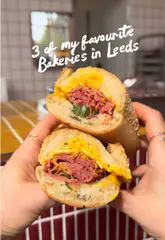 The video is a fast-paced listicle featuring three popular bakeries in Leeds: Chunk, Silver's Deli, and Doh Hut. The creator visits each location, showcasing their signature items like stuffed cookies, salt beef sandwiches, and filled doughnuts. The editing is dynamic, using close-up shots of the food being broken open to highlight textures, interspersed with shots of the venue interiors and the creator enjoying the products.