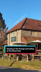 A travel and lifestyle reel showcasing a weekend stay at The Clock Tower on The Grange estate in Hampshire, followed by a dinner experience at The Woolpack Inn. The video features shots of the accommodation, the pub's outdoor terrace, and various dishes including camembert, stone bass, and steak.