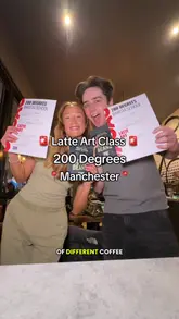 Two creators attend a latte art class at 200 Degrees Coffee, documenting the process of learning to steam milk and pour latte art. The video captures the fun, competitive nature of the experience, showing the equipment, the instructor's guidance, and the final coffee creations.