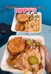 Here are a few options for your SEO alt text, keeping under the 125-character limit:

**Option 1 (Descriptive):**
Juicy fried chicken burger with dipping sauce at Dippy’s, a new halal burger spot in Birmingham.

**Option 2 (Action-oriented):**
Close-up of a delicious dipped spicy burger at Dippy’s restaurant in Birmingham.

**Option 3 (Keyword-focused):**
A spicy fried chicken burger being dipped in sauce at Dippy’s, a popular halal food spot in Birmingham.

**SEO Tip:** The best alt text describes the visual content while naturally including your location and the product (e.g., "Birmingham," "burger," "halal").