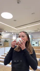 Here are a few options for your SEO alt text, keeping it under 125 characters:

**Option 1 (Descriptive):**
People learning how to make latte art at a Smeg coffee masterclass in their central London flagship store.

**Option 2 (Action-oriented):**
A group trying latte art at a Smeg coffee masterclass event in central London.

**Option 3 (Keyword-focused):**
Person pouring latte art during a Smeg coffee masterclass in London.

**SEO Tip:** The best alt text is descriptive enough for a screen reader while including your main keywords ("Smeg," "coffee masterclass," "London").