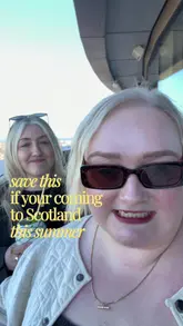 A vlog-style video featuring two creators recommending Joao's Place at the W Hotel in Edinburgh for its panoramic city views, suggesting it as a spot for drinks and sunset viewing, while also mentioning the adjacent Sushi Samba restaurant.