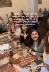 A short, handheld video capturing a group of women meeting up at a casual London venue. The video features shots of the group socializing, drinking, and eating pizza, with text overlays inviting viewers to join their social group.