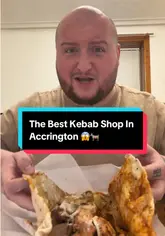 Accrington's "Best Kebab Shop" sign, with a goat and surprised face emoji, inviting foodies to try takeaway kebabs.