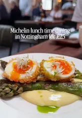 Diners enjoying a selection of colorful small plates with drinks at Piccalilli Nottingham, a Bib Gourmand restaurant.