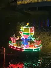 A montage of illuminated boats floating down a river at night, promoting the Matlock Bath Illuminations event.