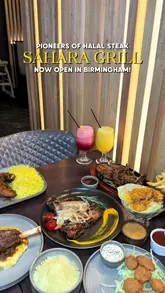 Here are a few options for your SEO alt text (all under 125 characters):

**Option 1 (Focus on main dishes):**
Platter of Sahara Grill’s signature lamb chops, T-bone steak, and shrimp at their Birmingham restaurant.

**Option 2 (Focus on location and experience):**
A delicious spread of halal steaks, lamb chops, and desserts at Sahara Grill in Birmingham.

**Option 3 (SEO-focused):**
Table full of gourmet halal steaks, grilled lamb chops, and appetizers at Sahara Grill Birmingham restaurant.